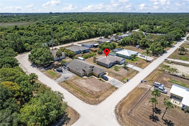 drone / aerial view with a forest view