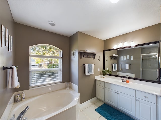 bathroom with vanity, separate shower and tub, and tile patterned floors