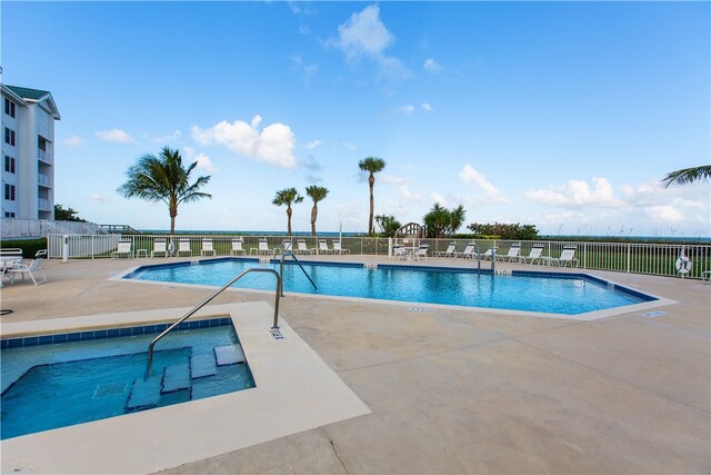 view of swimming pool featuring a patio