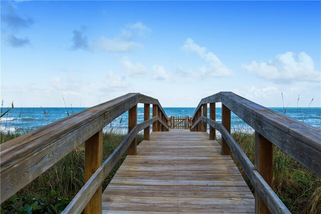 dock area featuring a water view