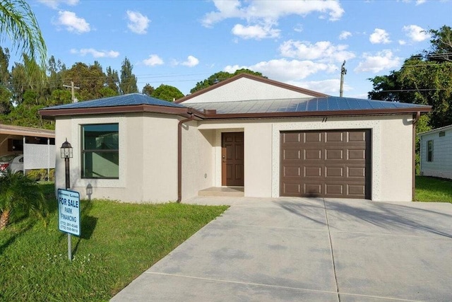 view of front of home with a garage