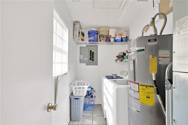 clothes washing area featuring independent washer and dryer, electric panel, water heater, and light tile patterned floors