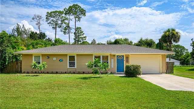 ranch-style home featuring a garage and a front lawn