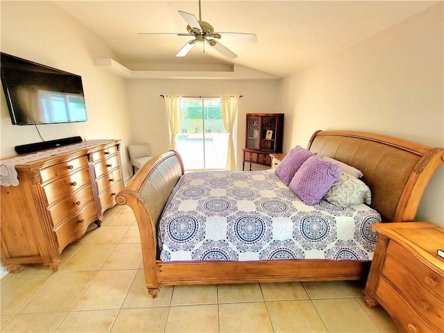 bedroom with lofted ceiling, access to exterior, light tile patterned floors, and ceiling fan