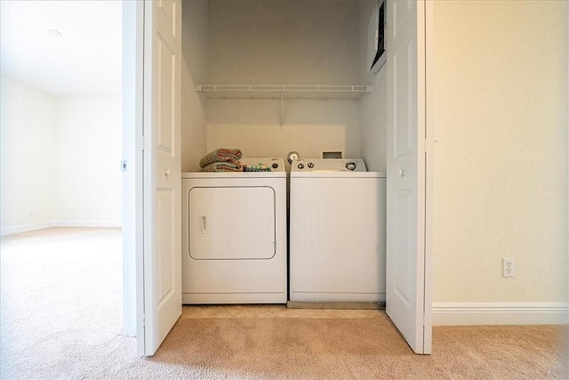 263 Provence Pl, Vero Beach, FL 32960 - laundry room with independent washer and dryer and light colored carpet