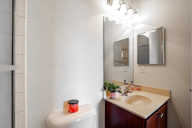 263 Provence Pl, Vero Beach, FL 32960 - bathroom featuring vanity and toilet