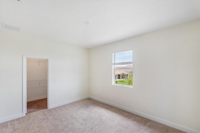 263 Provence Pl, Vero Beach, FL 32960 - empty room with light colored carpet and baseboards
