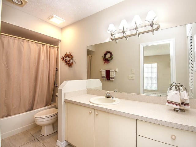 bathroom with a textured ceiling, toilet, vanity, tile patterned floors, and shower / bathtub combination with curtain