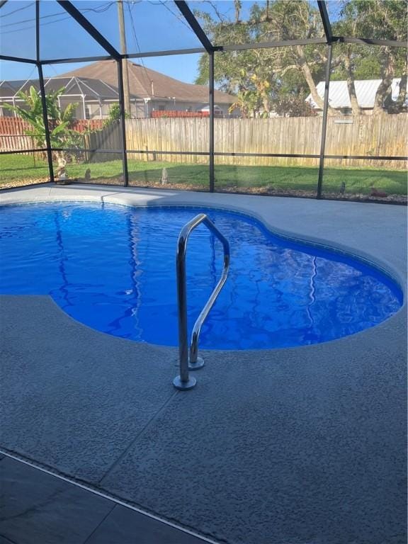 view of pool with fence, a lanai, and a fenced in pool