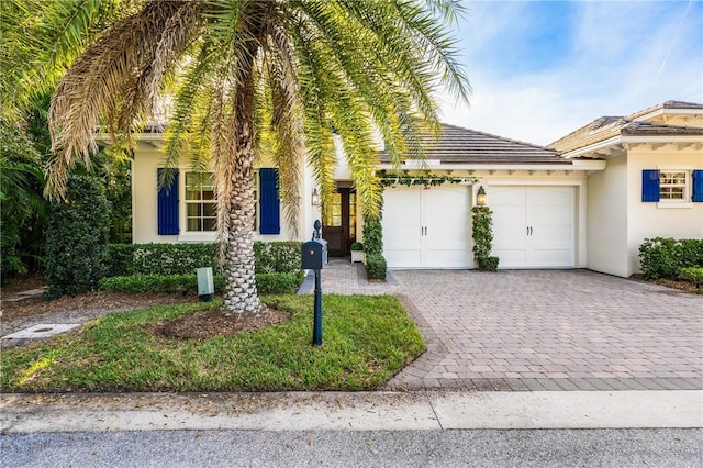 view of front of home featuring a garage