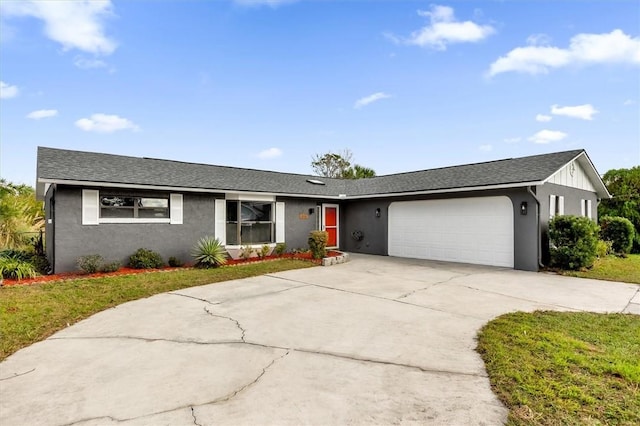 single story home with a garage