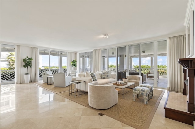 tiled living room with expansive windows and a healthy amount of sunlight