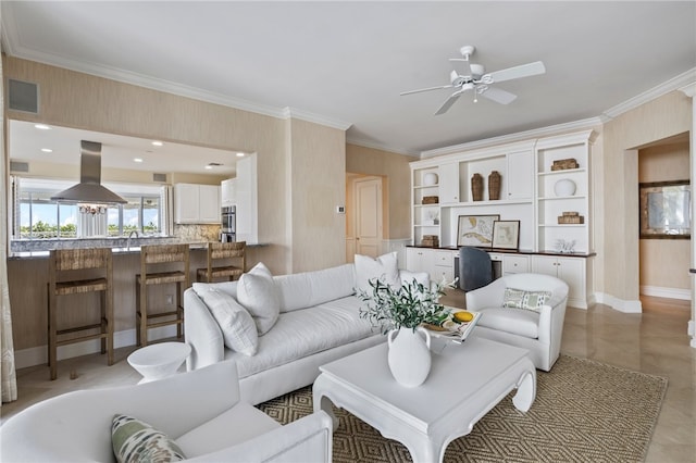 living room featuring ceiling fan and crown molding