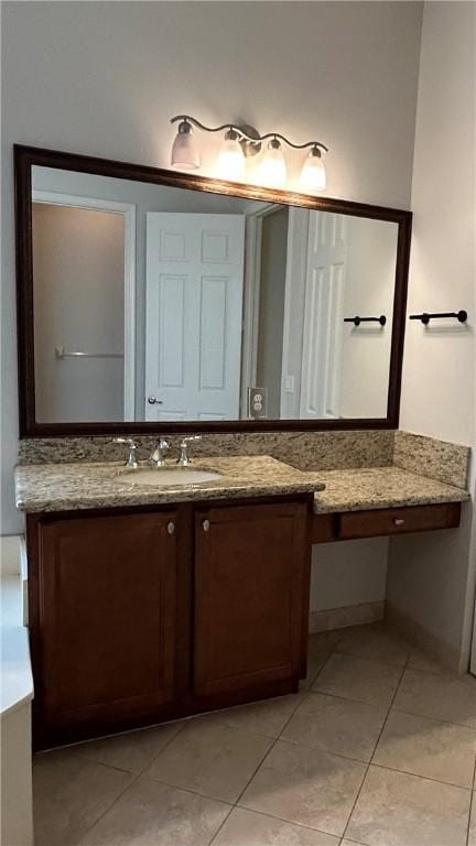 bathroom featuring vanity and tile patterned flooring