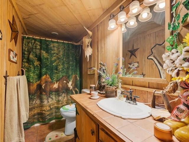 bathroom with wood ceiling, wooden walls, tile patterned floors, and toilet