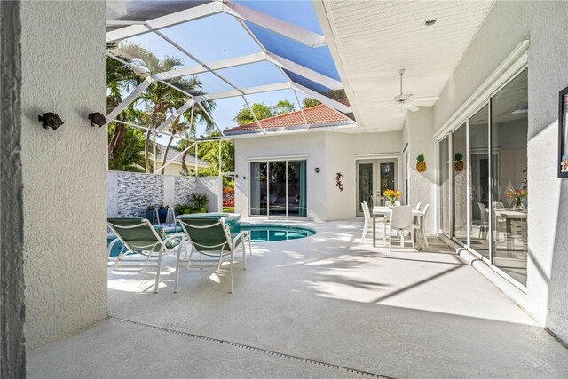 mediterranean / spanish house featuring a front yard and a garage