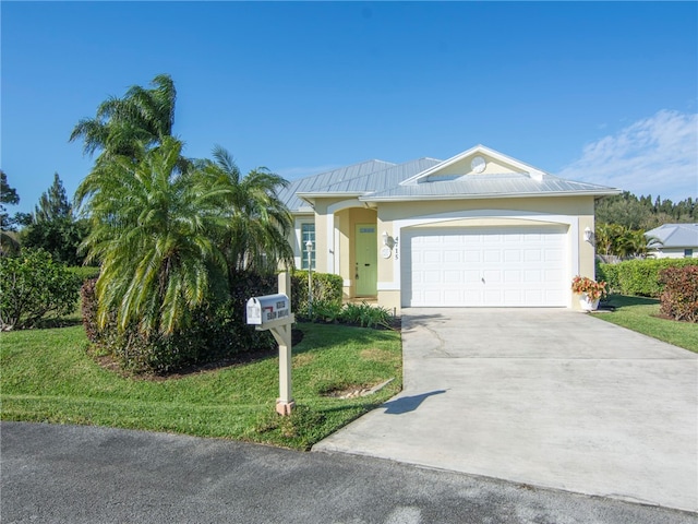 single story home with a front lawn and a garage