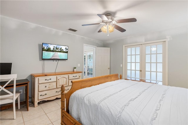 1635 71st Ct, Vero Beach, FL 32966 - bedroom featuring light tile patterned flooring, multiple windows, and ceiling fan