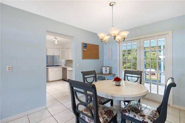 1635 71st Ct, Vero Beach, FL 32966 - dining room featuring a chandelier and light tile patterned floors