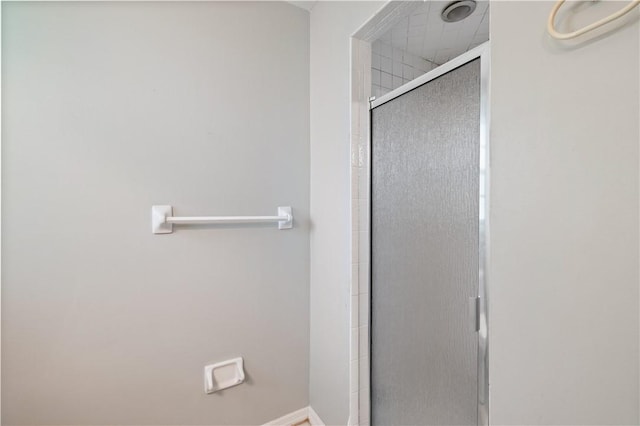 1635 71st Ct, Vero Beach, FL 32966 - bathroom with a shower stall and baseboards