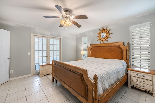 1635 71st Ct, Vero Beach, FL 32966 - bedroom featuring light tile patterned floors, french doors, and a ceiling fan