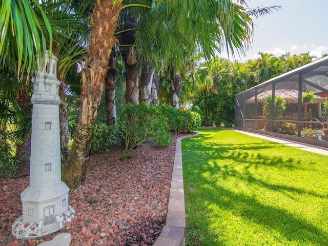 4335 65th Dr, Vero Beach, FL 32967 - view of grassy yard with glass enclosure