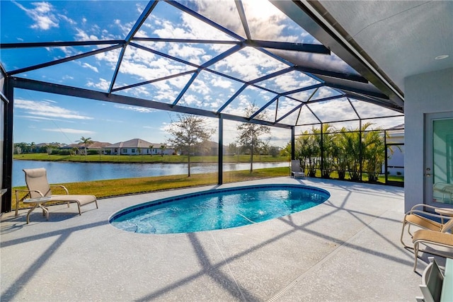 view of pool featuring a patio, a lanai, and a water view