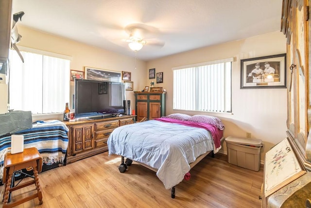 5740 Marina Dr Unit 2, Sebastian, FL 32958 - bedroom with ceiling fan and light wood-type flooring