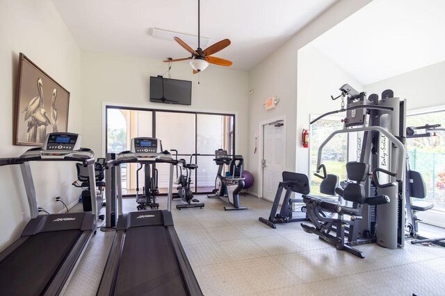 5740 Marina Dr Unit 2, Sebastian, FL 32958 - exercise room featuring ceiling fan and high vaulted ceiling