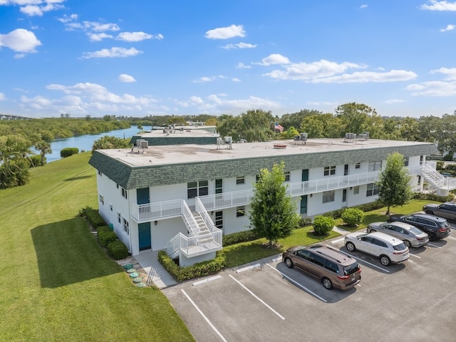 bird's eye view with a water view