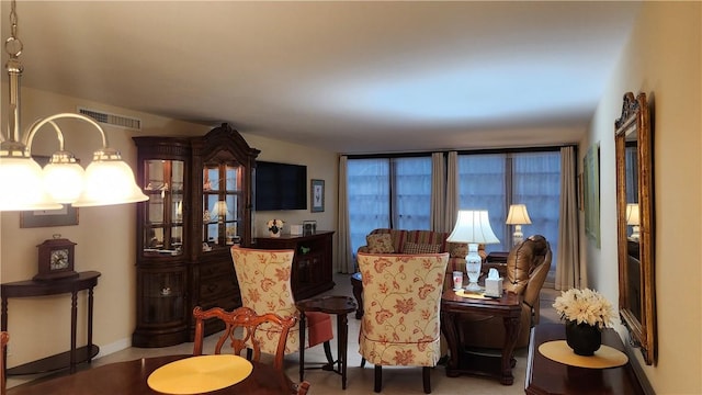 sitting room featuring visible vents