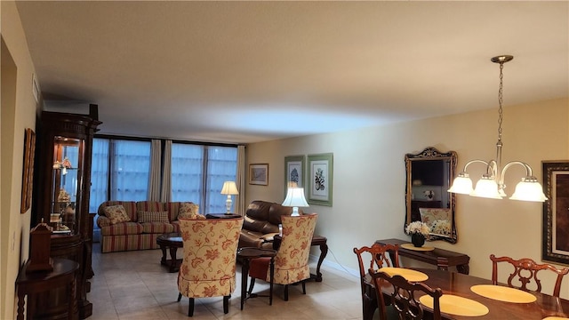 dining area featuring an inviting chandelier