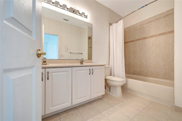 full bathroom with toilet, shower / tub combo, vanity, and tile patterned floors