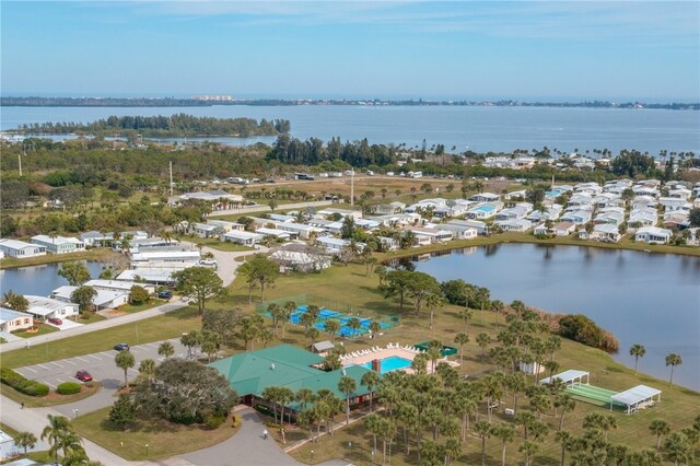 641 Hyacinth Cir, Barefoot Bay, FL 32976 - birds eye view of property with a residential view and a water view