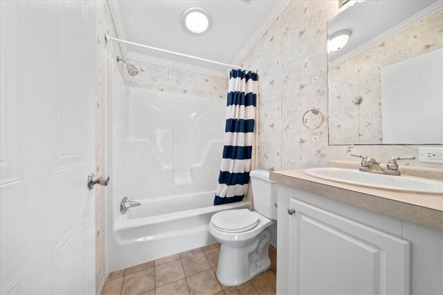641 Hyacinth Cir, Barefoot Bay, FL 32976 - bathroom with wallpapered walls, tile patterned flooring, ornamental molding, and toilet