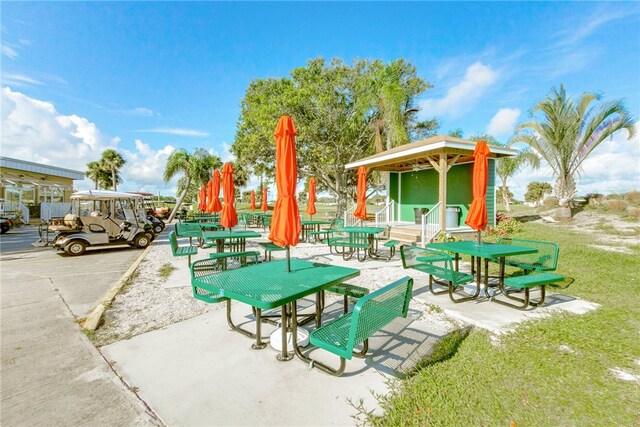 641 Hyacinth Cir, Barefoot Bay, FL 32976 - exterior space with a lawn