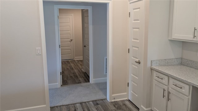 498 Easy St, Sebastian, FL 32958 - corridor featuring dark wood finished floors and baseboards