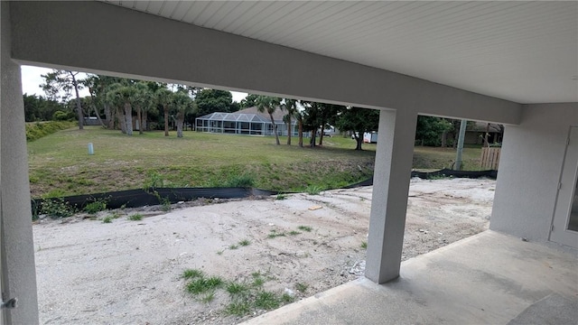 view of grassy yard featuring a patio