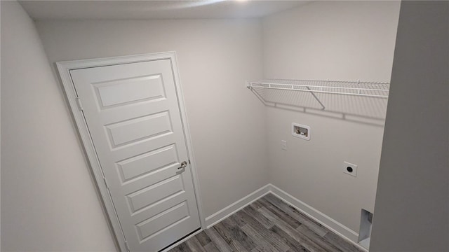 498 Easy St, Sebastian, FL 32958 - laundry area with washer hookup, hookup for an electric dryer, dark wood finished floors, and baseboards