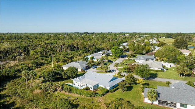 aerial view featuring a forest view