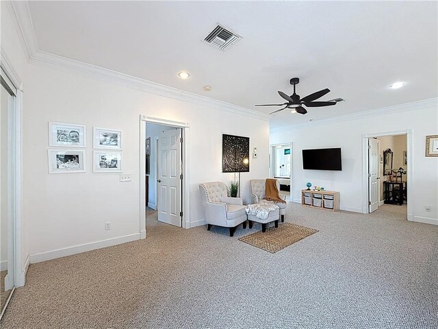 105 Charleston Oaks Dr, Port St Lucie, FL 34983 - sitting room featuring light colored carpet, ornamental molding, ceiling fan, baseboards, and recessed lighting