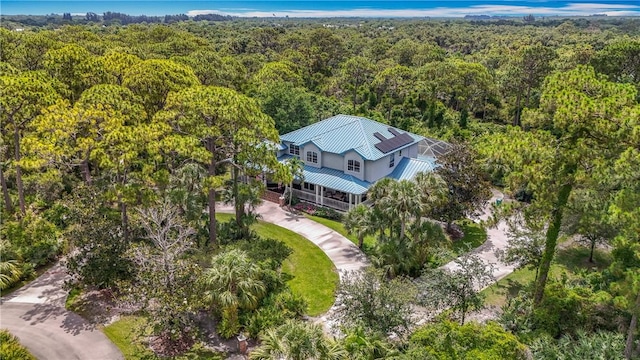 105 Charleston Oaks Dr, Port St Lucie, FL 34983 - aerial view of property and surrounding area featuring a forest