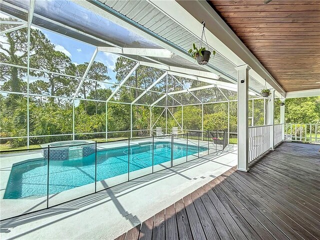 105 Charleston Oaks Dr, Port St Lucie, FL 34983 - view of pool featuring a pool with connected hot tub and glass enclosure