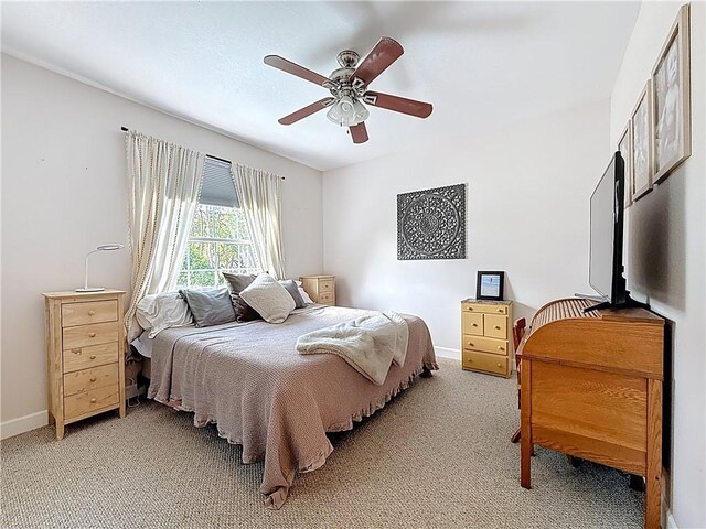 105 Charleston Oaks Dr, Port St Lucie, FL 34983 - bedroom with light carpet, ceiling fan, and baseboards