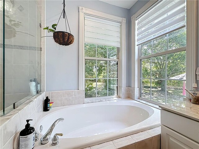105 Charleston Oaks Dr, Port St Lucie, FL 34983 - bathroom with a bath and vanity