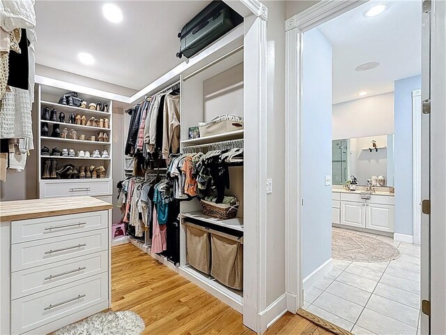 105 Charleston Oaks Dr, Port St Lucie, FL 34983 - spacious closet with light wood finished floors