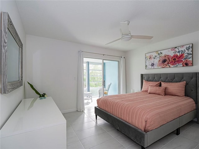 bedroom with access to outside and ceiling fan