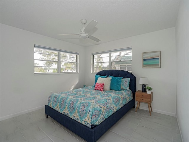 2800 Indian River Blvd Unit I10, Vero Beach, FL 32960 - bedroom featuring a ceiling fan and marble finish floors