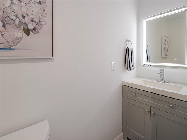 2800 Indian River Blvd Unit I10, Vero Beach, FL 32960 - bathroom with vanity and toilet
