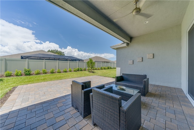 view of patio featuring ceiling fan and an outdoor hangout area